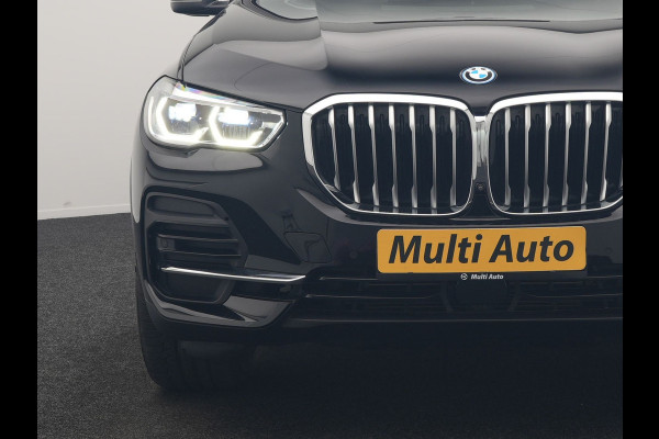 BMW X5 xDrive45e High Executive PHEV 395pk Dealer O.H. | Active Steering | Trekhaak Af Fabriek | Panodak | Luchtvering | Head Up | Adaptive Cruise | 360 Camera | Laser LED | Nappa Lederen Comfortstoelen Memory & Verwarmd | Adaptief Onderstel | Keyless | Sfeerverlichting | Apple Carplay | 21"L.M | Plug In Hybrid |