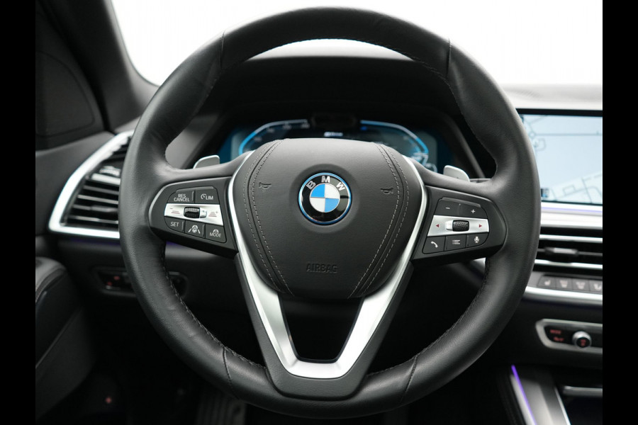 BMW X5 xDrive45e High Executive PHEV 395pk Dealer O.H. | Active Steering | Trekhaak Af Fabriek | Panodak | Luchtvering | Head Up | Adaptive Cruise | 360 Camera | Laser LED | Nappa Lederen Comfortstoelen Memory & Verwarmd | Adaptief Onderstel | Keyless | Sfeerverlichting | Apple Carplay | 21"L.M | Plug In Hybrid |