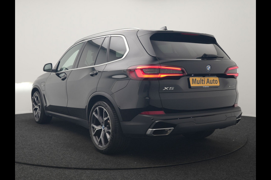 BMW X5 xDrive45e High Executive PHEV 395pk Dealer O.H. | Active Steering | Trekhaak Af Fabriek | Panodak | Luchtvering | Head Up | Adaptive Cruise | 360 Camera | Laser LED | Nappa Lederen Comfortstoelen Memory & Verwarmd | Adaptief Onderstel | Keyless | Sfeerverlichting | Apple Carplay | 21"L.M | Plug In Hybrid |
