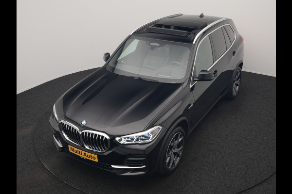 BMW X5 xDrive45e High Executive PHEV 395pk Dealer O.H. | Active Steering | Trekhaak Af Fabriek | Panodak | Luchtvering | Head Up | Adaptive Cruise | 360 Camera | Laser LED | Nappa Lederen Comfortstoelen Memory & Verwarmd | Adaptief Onderstel | Keyless | Sfeerverlichting | Apple Carplay | 21"L.M | Plug In Hybrid |
