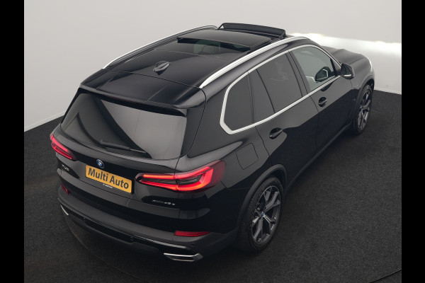 BMW X5 xDrive45e High Executive PHEV 395pk Dealer O.H. | Active Steering | Trekhaak Af Fabriek | Panodak | Luchtvering | Head Up | Adaptive Cruise | 360 Camera | Laser LED | Nappa Lederen Comfortstoelen Memory & Verwarmd | Adaptief Onderstel | Keyless | Sfeerverlichting | Apple Carplay | 21"L.M | Plug In Hybrid |