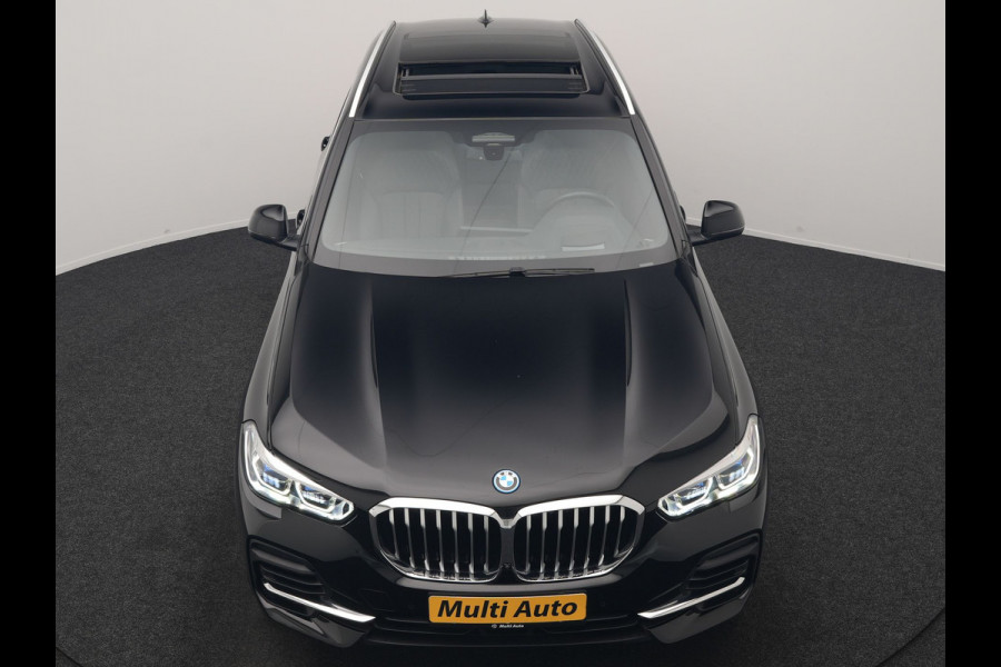 BMW X5 xDrive45e High Executive PHEV 395pk Dealer O.H. | Active Steering | Trekhaak Af Fabriek | Panodak | Luchtvering | Head Up | Adaptive Cruise | 360 Camera | Laser LED | Nappa Lederen Comfortstoelen Memory & Verwarmd | Adaptief Onderstel | Keyless | Sfeerverlichting | Apple Carplay | 21"L.M | Plug In Hybrid |