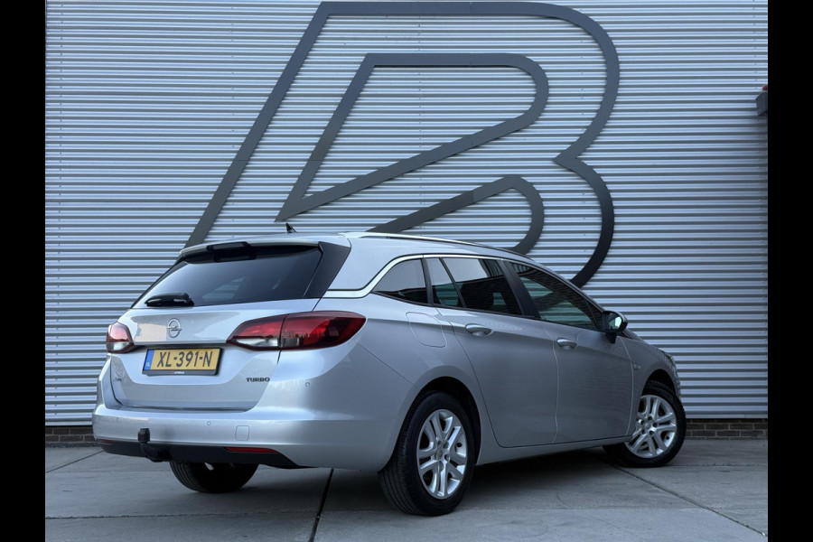 Opel Astra Sports Tourer 1.4 Turbo Online Edition 2e Eigenaar|Navi|Trekhaak|Clima|Cruise|Carplay|PDC|Elek ramen|N.A.P|APK tot 01-2027