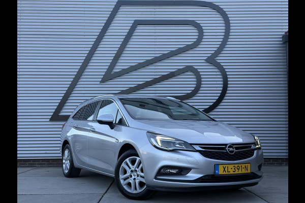 Opel Astra Sports Tourer 1.4 Turbo Online Edition 2e Eigenaar|Navi|Trekhaak|Clima|Cruise|Carplay|PDC|Elek ramen|N.A.P|APK tot 01-2027
