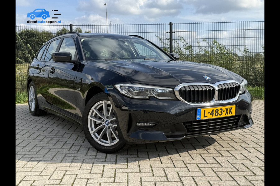 BMW 3 Serie Touring 320e Business Edition Plus | Camera | Laser | Stoelverwarming | Carplay |