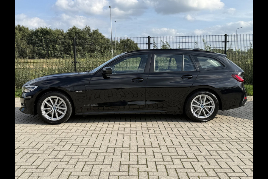 BMW 3 Serie Touring 320e Business Edition Plus | Camera | Laser | Stoelverwarming | Carplay |