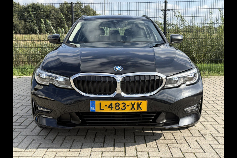BMW 3 Serie Touring 320e Business Edition Plus | Camera | Laser | Stoelverwarming | Carplay |