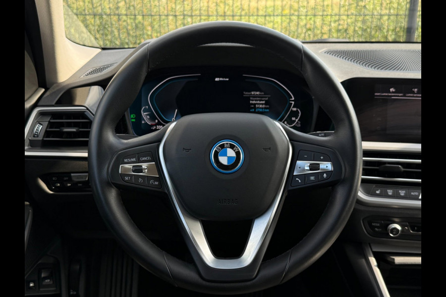 BMW 3 Serie Touring 320e Business Edition Plus | Camera | Laser | Stoelverwarming | Carplay |