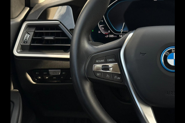 BMW 3 Serie Touring 320e Business Edition Plus | Camera | Laser | Stoelverwarming | Carplay |