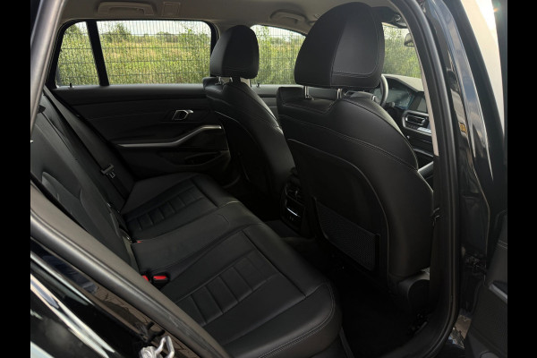 BMW 3 Serie Touring 320e Business Edition Plus | Camera | Laser | Stoelverwarming | Carplay |