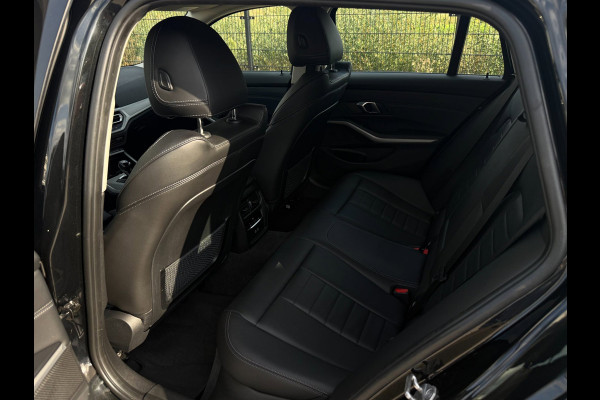 BMW 3 Serie Touring 320e Business Edition Plus | Camera | Laser | Stoelverwarming | Carplay |