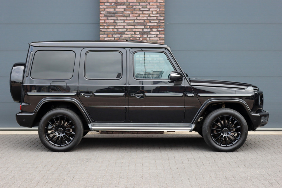Mercedes-Benz G-Klasse 500 V8 | Schuifdak | Distronic+ | Standkachel | Burmester | Massage | Leder Exclusief | Stoelventilatie | Trekhaak | Sfeerverlichting | Apple Carplay |