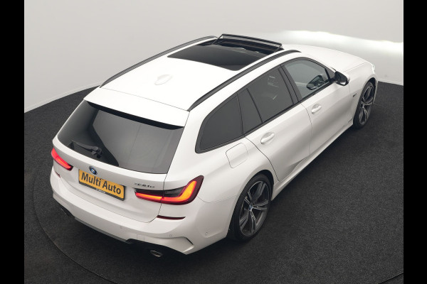 BMW 3 Serie Touring 330e M Sport PHEV 293pk Dealer O.H. | Panodak | Laser LED | Head Up | Adaptief Onderstel | Camera | Lederen Sportstoelen & Stuur Verwarmd | Sfeerverlichting | Keyless | BLIS | Apple Carplay | Virtual | Navigatie | DAB | Plug In Hybrid |