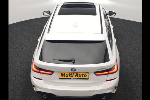 BMW 3 Serie Touring 330e M Sport PHEV 293pk Dealer O.H. | Panodak | Laser LED | Head Up | Adaptief Onderstel | Camera | Lederen Sportstoelen & Stuur Verwarmd | Sfeerverlichting | Keyless | BLIS | Apple Carplay | Virtual | Navigatie | DAB | Plug In Hybrid |