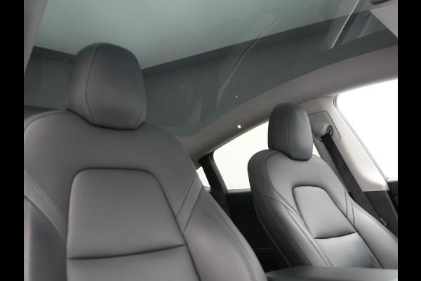 Tesla Model Y Long Range AWD 75 kWh 441pk | Full Self-Driving Capability | Panodak | Adaptive Cruise | 360 Camera | Lederen Sportstoelen Memory & Verwarmd | Navigatie |