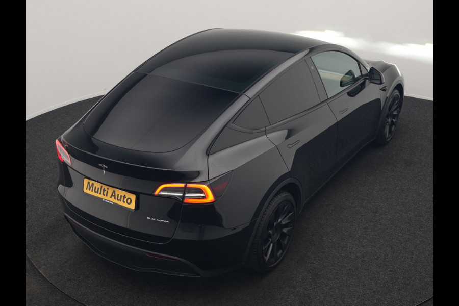Tesla Model Y Long Range AWD 75 kWh 441pk | Full Self-Driving Capability | Panodak | Adaptive Cruise | 360 Camera | Lederen Sportstoelen Memory & Verwarmd | Navigatie |