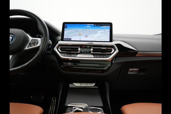 BMW iX3 M Sport 80 kWh 286pk Dealer O.H | Panodak | Adaptive Cruise | Camera | Lederen Sportstoelen Memory & Verwarmd | Sfeerverlichting | Blis | Apple Carplay | Navigatie | DAB | 19"L.M