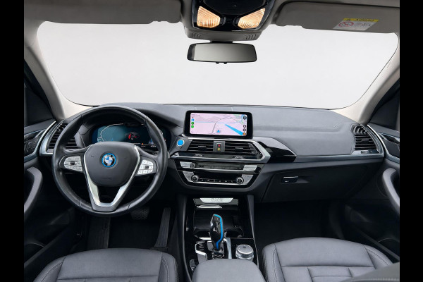 BMW iX3 High Executive Edition 80 kWh SOH 98,6% Panoramadak Trekhaak Navigatie Apple CarPlay Android Auto Camera Parkeerhulp Adaptive Cruise Control Stoelverwarming Full Led Leder Climate Control Lichtmetalen velgen