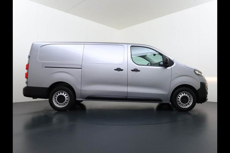 Opel Vivaro 2.0CDTI 145PK L3H1 3-Persoons Trekhaak 360°Camera Airco Navi Apple Carplay Android Auto Bluetooth Regen-Lichtsensor Cruise Control Betonplex Vloer Lat om lat betimmering Schuifdeur 2.500KG Trekgewicht Origineel Nederlandse Auto