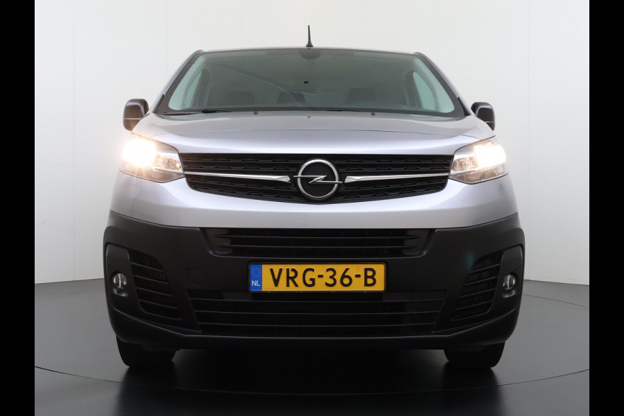 Opel Vivaro 2.0CDTI 145PK L3H1 3-Persoons Trekhaak 360°Camera Airco Navi Apple Carplay Android Auto Bluetooth Regen-Lichtsensor Cruise Control Betonplex Vloer Lat om lat betimmering Schuifdeur 2.500KG Trekgewicht Origineel Nederlandse Auto