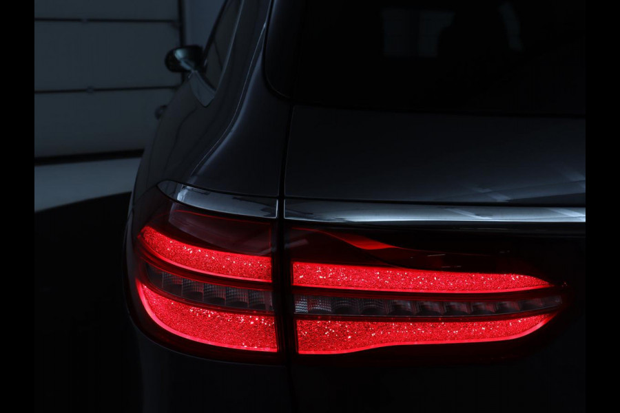 Mercedes-Benz E-Klasse Estate 200 d | Half Leder | Trekhaak | Camera | Adaptive cruise | Sfeerverlichting | Park assist | Navigatie | Full LED |