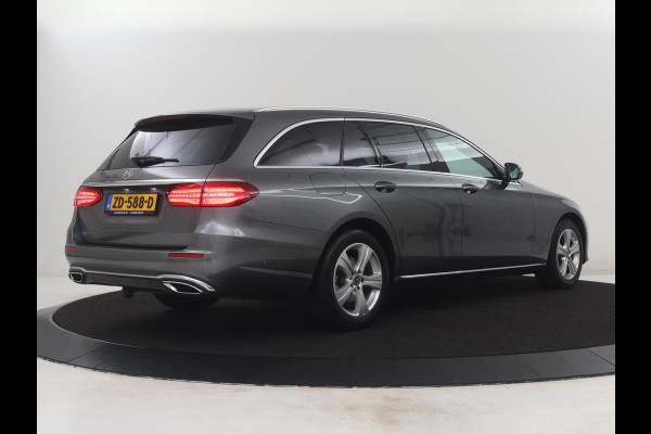 Mercedes-Benz E-Klasse Estate 200 d | Half Leder | Trekhaak | Camera | Adaptive cruise | Sfeerverlichting | Park assist | Navigatie | Full LED |