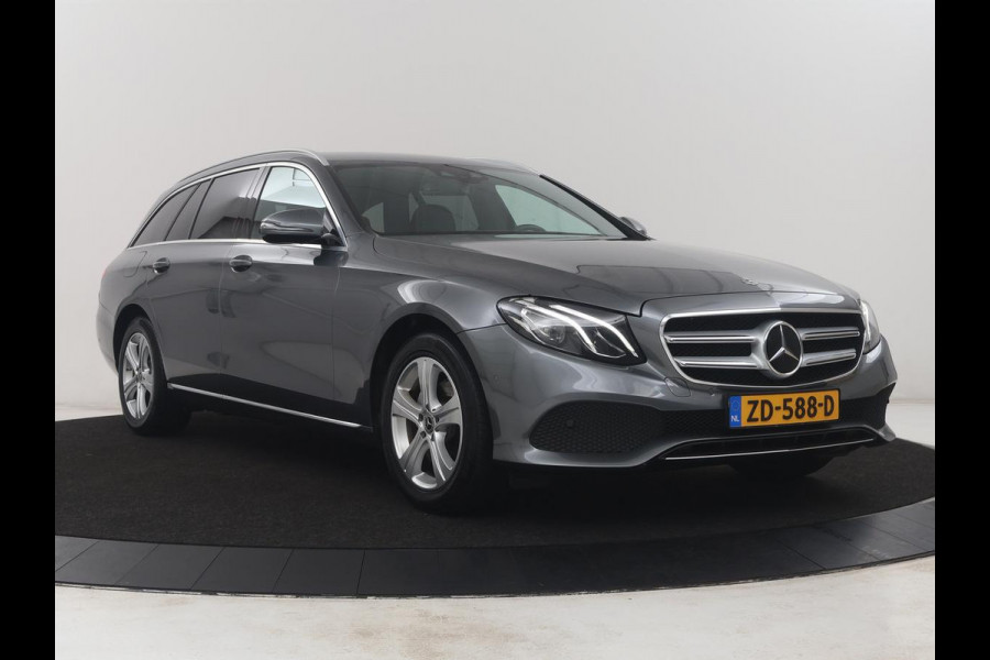 Mercedes-Benz E-Klasse Estate 200 d | Half Leder | Trekhaak | Camera | Adaptive cruise | Sfeerverlichting | Park assist | Navigatie | Full LED |
