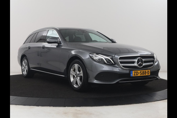 Mercedes-Benz E-Klasse Estate 200 d | Half Leder | Trekhaak | Camera | Adaptive cruise | Sfeerverlichting | Park assist | Navigatie | Full LED |
