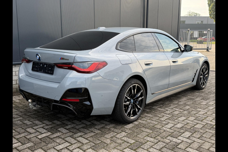 BMW i4 M50 High Executive 84 kWh 19"/SOH 99%/Schuif-kanteldak/Trekhaak/Leder + memory/Stoel + stuurverwarming/Harman Kardon/Dodehoek/Adaptieve cruise/Keyless/360 camera