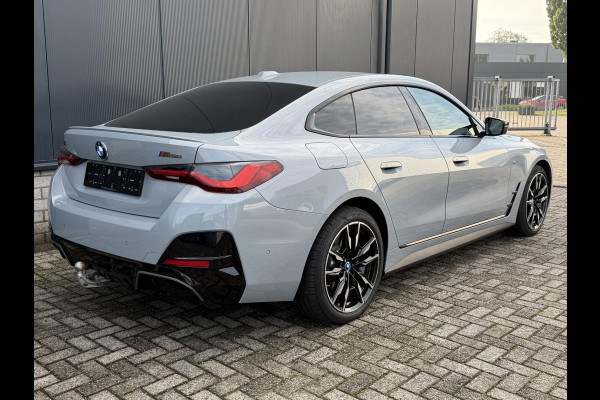 BMW i4 M50 High Executive 84 kWh 19"/SOH 99%/Schuif-kanteldak/Trekhaak/Leder + memory/Stoel + stuurverwarming/Harman Kardon/Dodehoek/Adaptieve cruise/Keyless/360 camera