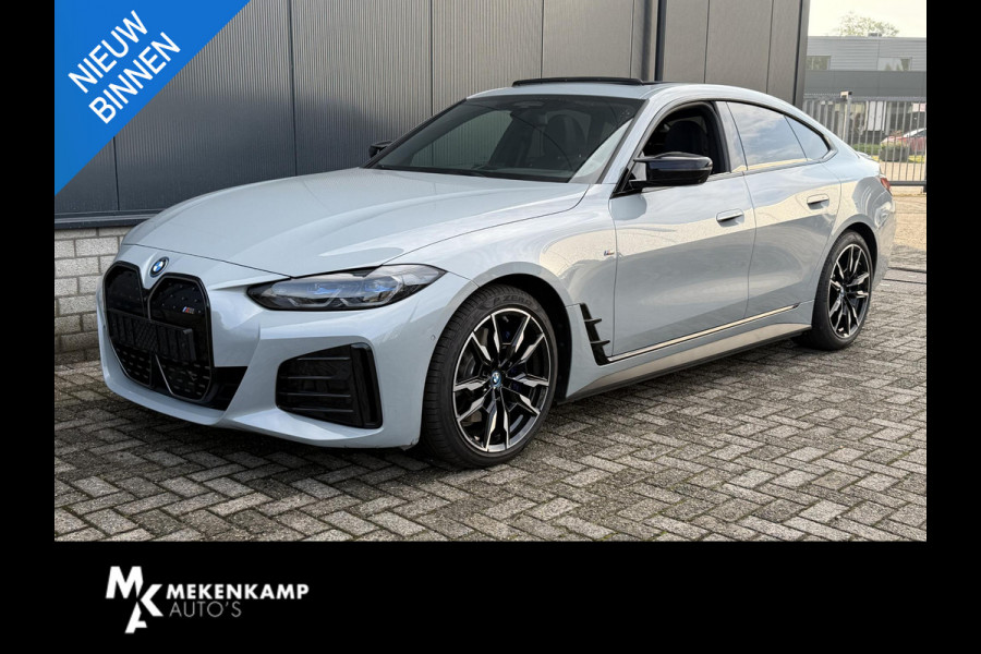 BMW i4 M50 High Executive 84 kWh 19"/SOH 99%/Schuif-kanteldak/Trekhaak/Leder + memory/Stoel + stuurverwarming/Harman Kardon/Dodehoek/Adaptieve cruise/Keyless/360 camera