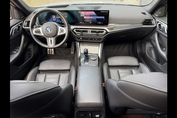 BMW i4 M50 High Executive 84 kWh 19"/SOH 99%/Schuif-kanteldak/Trekhaak/Leder + memory/Stoel + stuurverwarming/Harman Kardon/Dodehoek/Adaptieve cruise/Keyless/360 camera