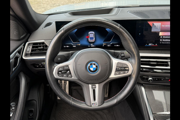 BMW i4 M50 High Executive 84 kWh 19"/SOH 99%/Schuif-kanteldak/Trekhaak/Leder + memory/Stoel + stuurverwarming/Harman Kardon/Dodehoek/Adaptieve cruise/Keyless/360 camera