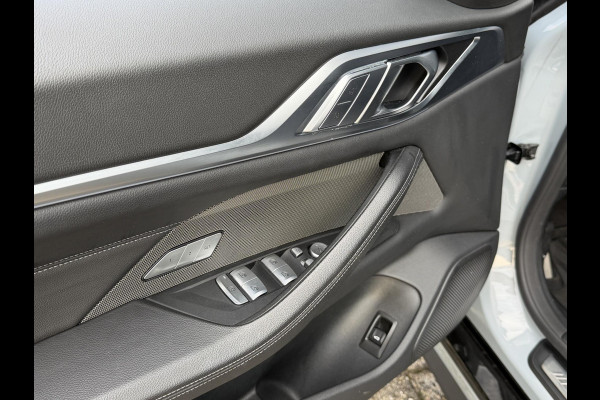 BMW i4 M50 High Executive 84 kWh 19"/SOH 99%/Schuif-kanteldak/Trekhaak/Leder + memory/Stoel + stuurverwarming/Harman Kardon/Dodehoek/Adaptieve cruise/Keyless/360 camera