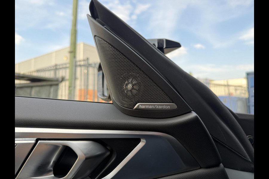 BMW i4 M50 High Executive 84 kWh 19"/SOH 99%/Schuif-kanteldak/Trekhaak/Leder + memory/Stoel + stuurverwarming/Harman Kardon/Dodehoek/Adaptieve cruise/Keyless/360 camera