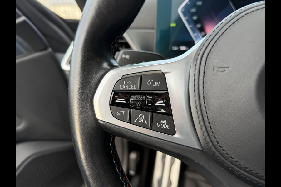 BMW i4 M50 High Executive 84 kWh 19"/SOH 99%/Schuif-kanteldak/Trekhaak/Leder + memory/Stoel + stuurverwarming/Harman Kardon/Dodehoek/Adaptieve cruise/Keyless/360 camera