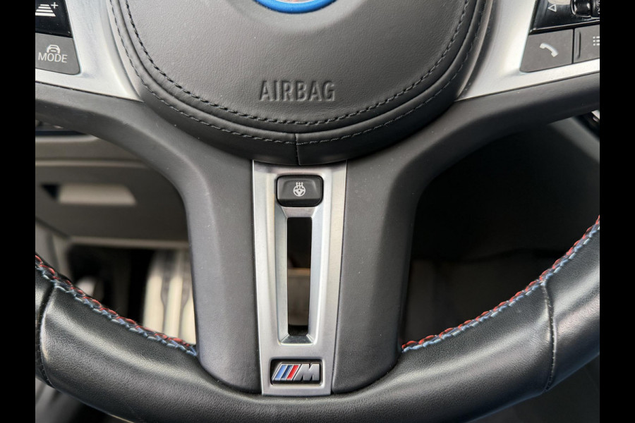 BMW i4 M50 High Executive 84 kWh 19"/SOH 99%/Schuif-kanteldak/Trekhaak/Leder + memory/Stoel + stuurverwarming/Harman Kardon/Dodehoek/Adaptieve cruise/Keyless/360 camera
