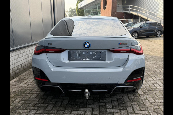 BMW i4 M50 High Executive 84 kWh 19"/SOH 99%/Schuif-kanteldak/Trekhaak/Leder + memory/Stoel + stuurverwarming/Harman Kardon/Dodehoek/Adaptieve cruise/Keyless/360 camera
