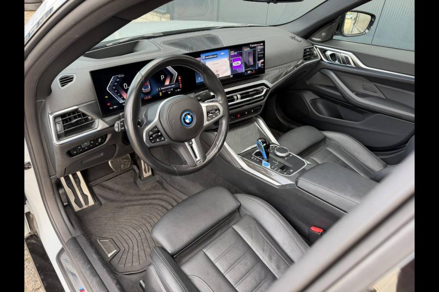 BMW i4 M50 High Executive 84 kWh 19"/SOH 99%/Schuif-kanteldak/Trekhaak/Leder + memory/Stoel + stuurverwarming/Harman Kardon/Dodehoek/Adaptieve cruise/Keyless/360 camera