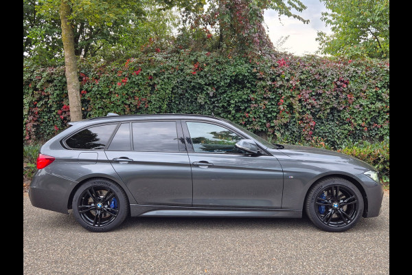 BMW 3 Serie Touring 320i Edition M Sport Shadow Executive Volle optielijst Pano M Remmen Trekhaak