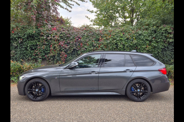 BMW 3 Serie Touring 320i Edition M Sport Shadow Executive Volle optielijst Pano M Remmen Trekhaak