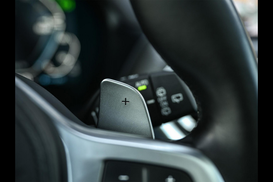 BMW X3 xDrive30e High Executive M-sport | Panoramadak | Harman/Kardon | Camera | Active Cruise | Memory Seat | BMW Gesture Control | Stuurverwarming | Stoelverwarming | Trekhaak |