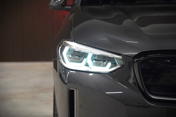 BMW iX3 High Executive 80 kWh | Panoramadak | Harman Kardon | Head-Up Display | Adaptive Cruise Control | Stoelverwarming | Dodehoekdetectie | Keyless | Trekhaak | 360 Camera | Ambiance Verlichting |