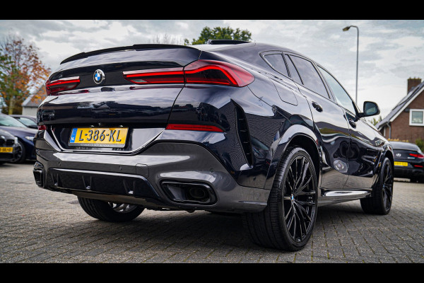 BMW X6 XDrive40i High Executive | Panorama | 360cam | Carbon | Adaptieve cruise control | Kristallen pook | 22 inch | Dealer onder