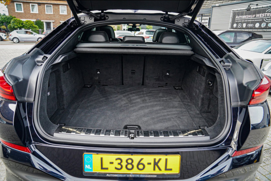 BMW X6 XDrive40i High Executive | Panorama | 360cam | Carbon | Adaptieve cruise control | Kristallen pook | 22 inch | Dealer onder