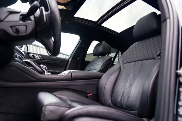 BMW X6 XDrive40i High Executive | Panorama | 360cam | Carbon | Adaptieve cruise control | Kristallen pook | 22 inch | Dealer onder