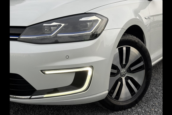 Volkswagen e-Golf e-Golf ✓SOH 85,18 %✓2e Eigenaar✓Carplay✓Navi✓Clima✓Cruise✓Pdc V+A✓136pk✓Lm velgen✓Bj 12-2018✓N.A.P✓Apk tot 10-2027
