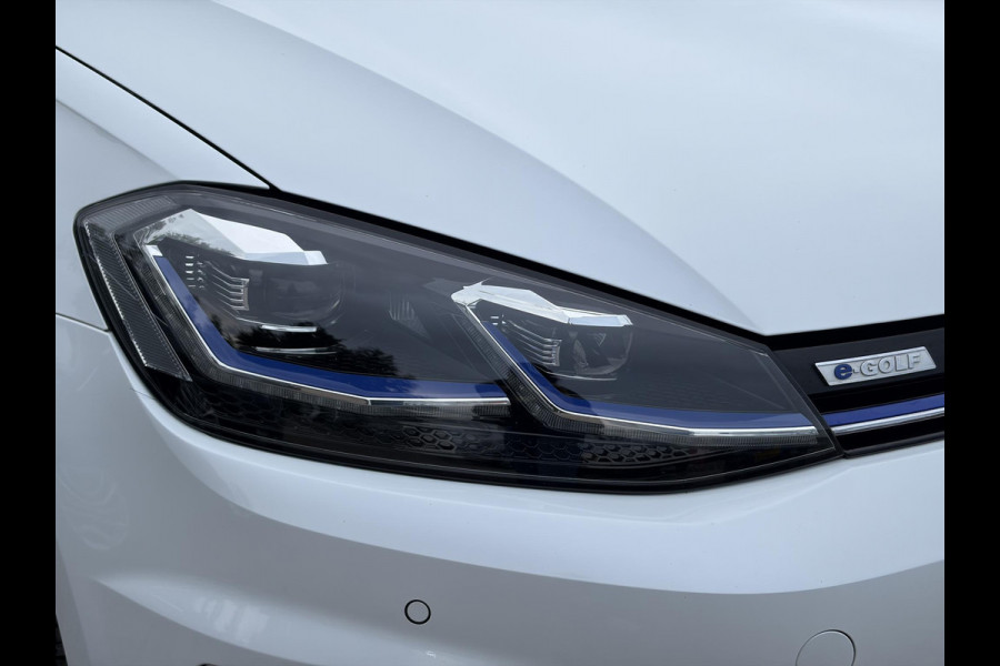 Volkswagen e-Golf e-Golf ✓SOH 85,18 %✓2e Eigenaar✓Carplay✓Navi✓Clima✓Cruise✓Pdc V+A✓136pk✓Lm velgen✓Bj 12-2018✓N.A.P✓Apk tot 10-2027