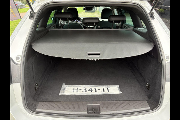Opel Astra Sports Tourer 1.2 Elegance ✓110pk✓Camera✓Carplay✓Navi✓Halfleder✓Keyless✓Trekhaak✓Pdc V+A✓Clima✓Cruise✓Elekt Stoel✓Recent beurt gehad✓Dodehoeksensor✓Rijstrooksensor✓Lm velgen✓N.A.P✓Apk tot 11-2027