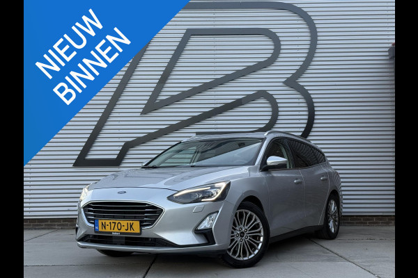 Ford FOCUS Wagon 1.0 EcoBoost Titanium Business 2e Eigenaar|Navi|Camera|Trekhaak|Clima|Stoelverwarming|PDC V+A|Carplay|APK tot 04-2027